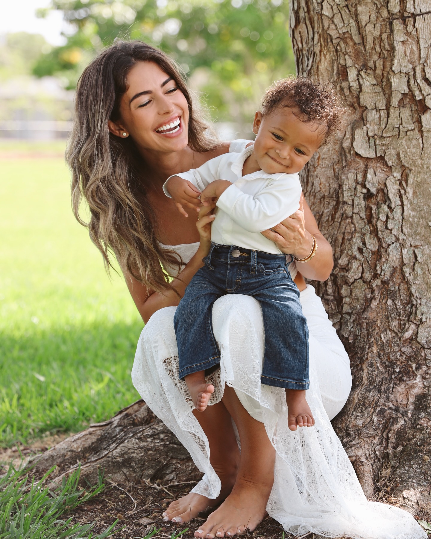 Cyd Rose laughing with her child